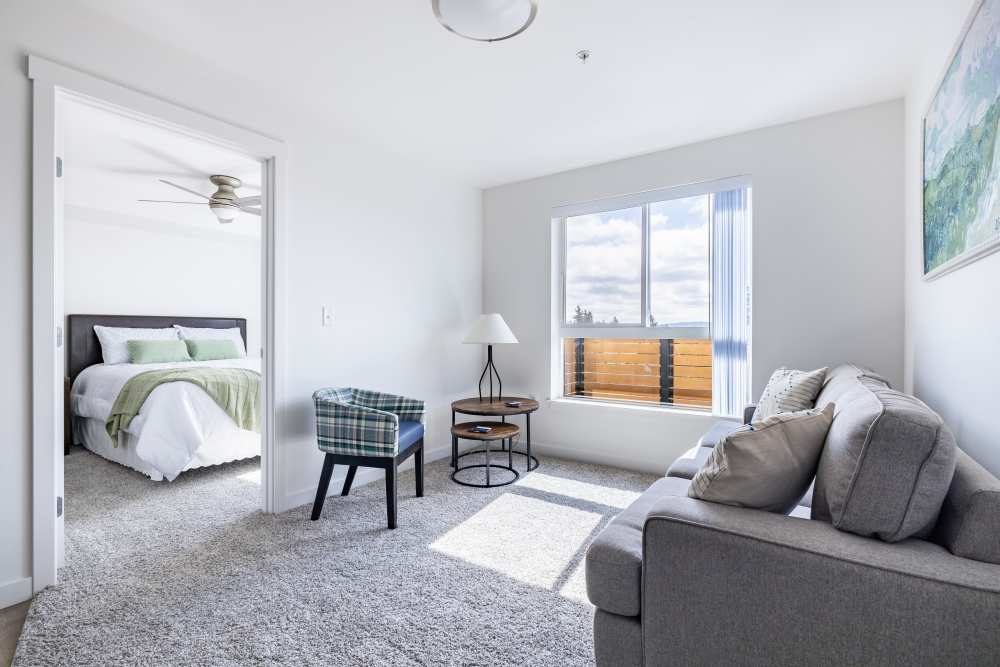 Photo of apartment living room at Traditions at Hazelwood in Portland, Oregon