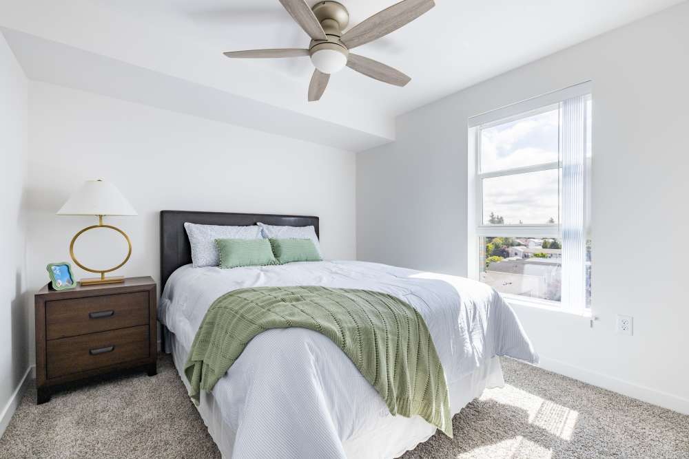 Photo of primary bedroom in apartment at Traditions at Hazelwood in Portland, Oregon,