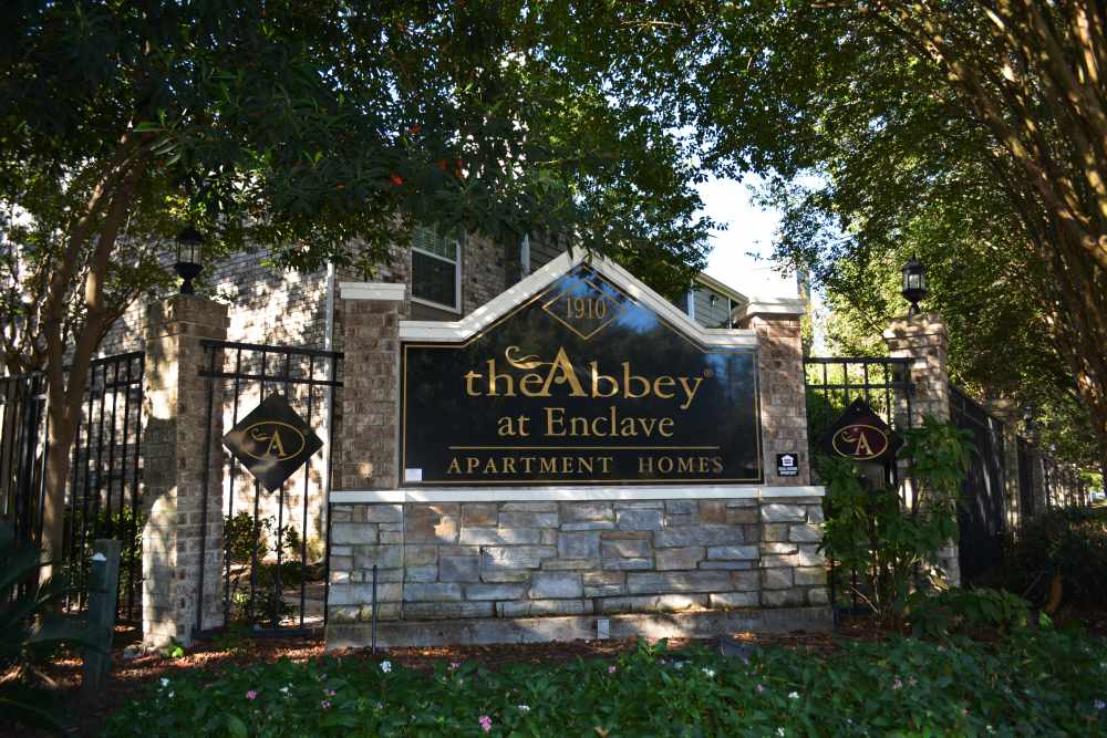 Community signage at The Abbey At Enclave in Houston, Texas