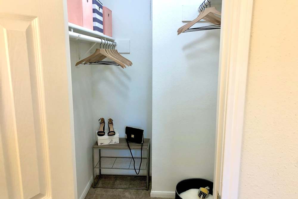 Closet with cloth hangers  at The Abbey At Enclave in Houston, Texas