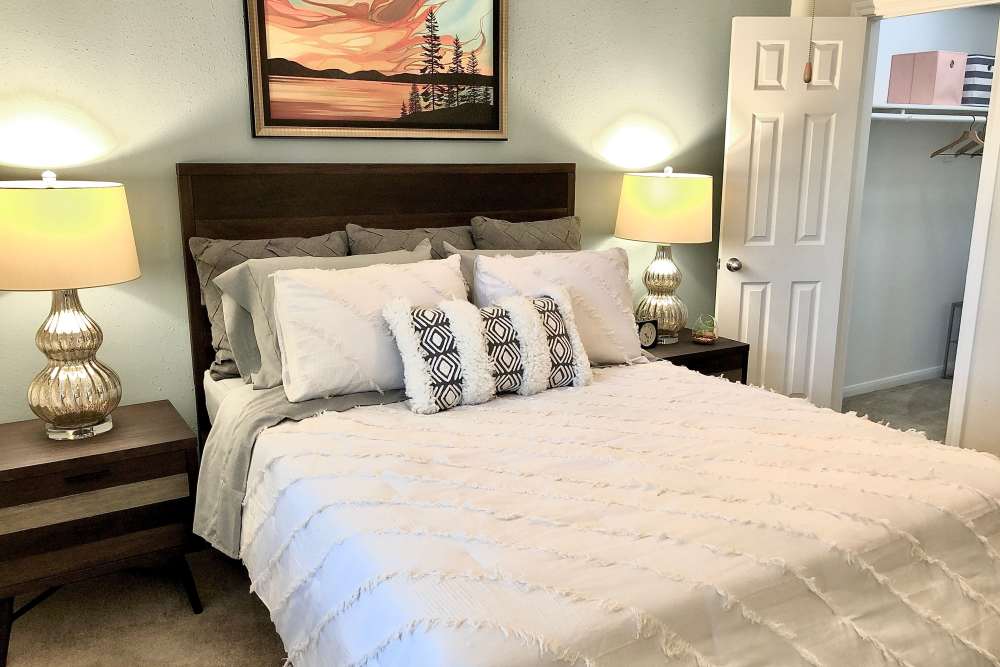 Bedroom with side lamps  at The Abbey At Enclave in Houston, Texas