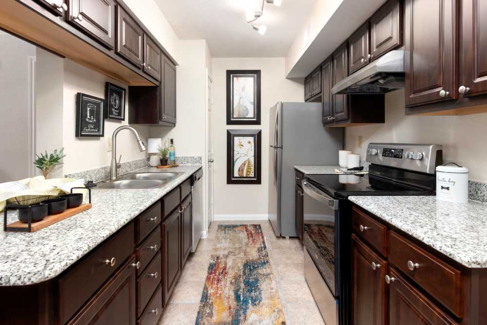 Kitchen with photo frames  at The Abbey At Enclave in Houston, Texas