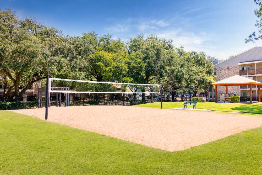 Volley ball court with cabana at The Abbey At Enclave in Houston, Texas