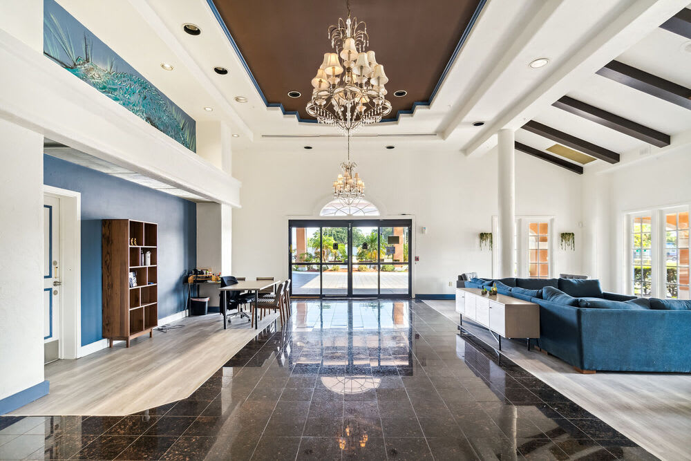 Luxury community hall with large celling and beautiful couch at Vivo Living Kissimmee in Kissimmee, Florida