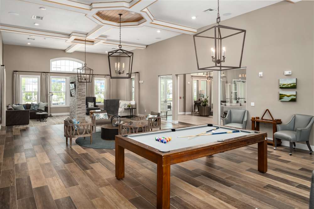 Welcoming seating in the community clubhouse at Shadetree Apartments in Ruskin, Florida