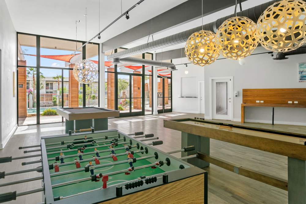 Game room with foosball at Sentry Tempe in Tempe, Arizona