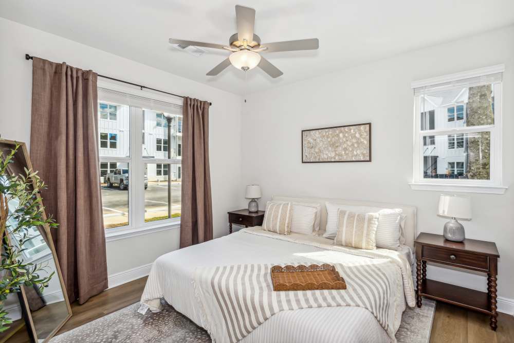 Pet-Friendly Apartments in Pensacola, FL - City North - Bedroom with Carpeting and Spacious Windows