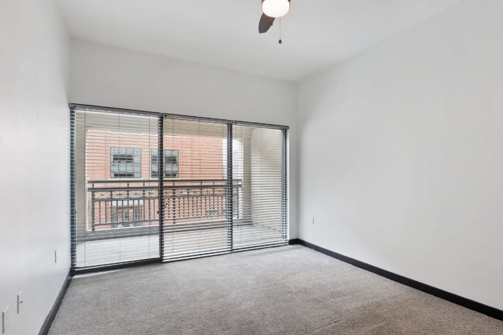  Model unit bedroom with balcony at 17th Street Lofts in Atlanta, Georgia