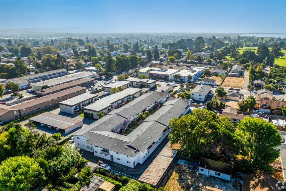 Two-Bedroom Apartments in San Leandro, CA - Marina Plaza Apartments -  Apartment Complex  aeriel View, and Sidewalk Access with lush courtyards