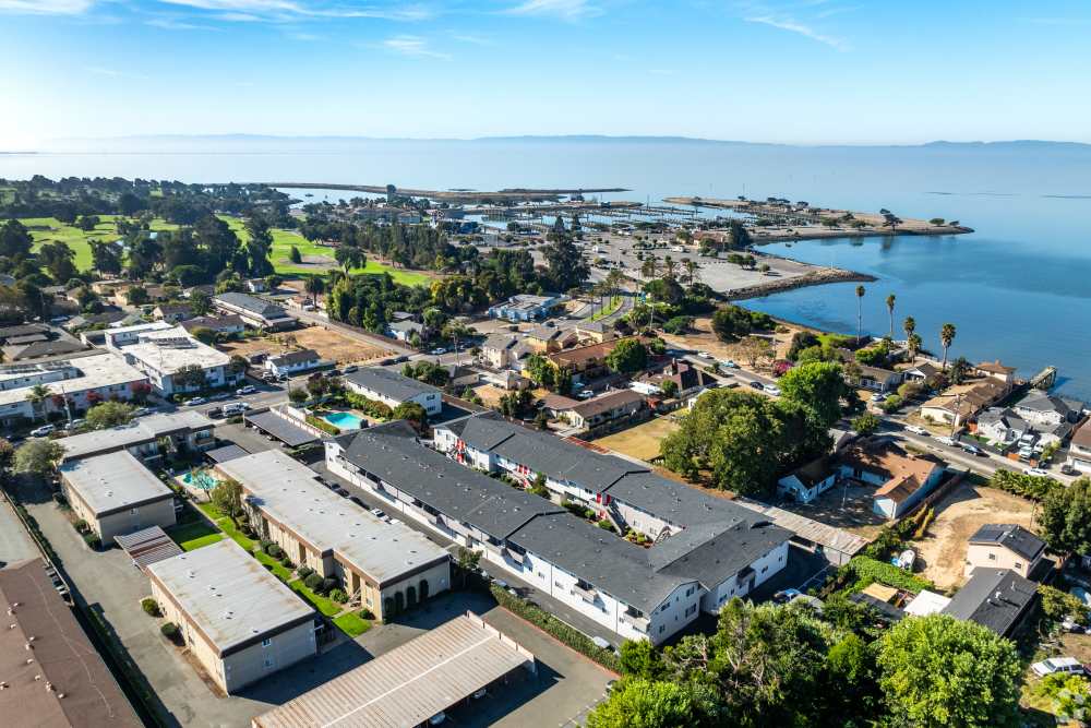Two-Bedroom Apartments in San Leandro, CA - Marina Plaza Apartments -  Apartment Complex  aeriel View, and Sidewalk Access with lush courtyards