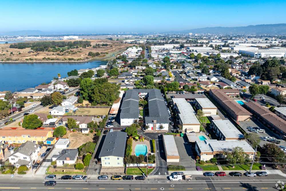 Two-Bedroom Apartments in San Leandro, CA - Marina Plaza Apartments -  Apartment Complex  aeriel View, and Sidewalk Access with lush courtyards