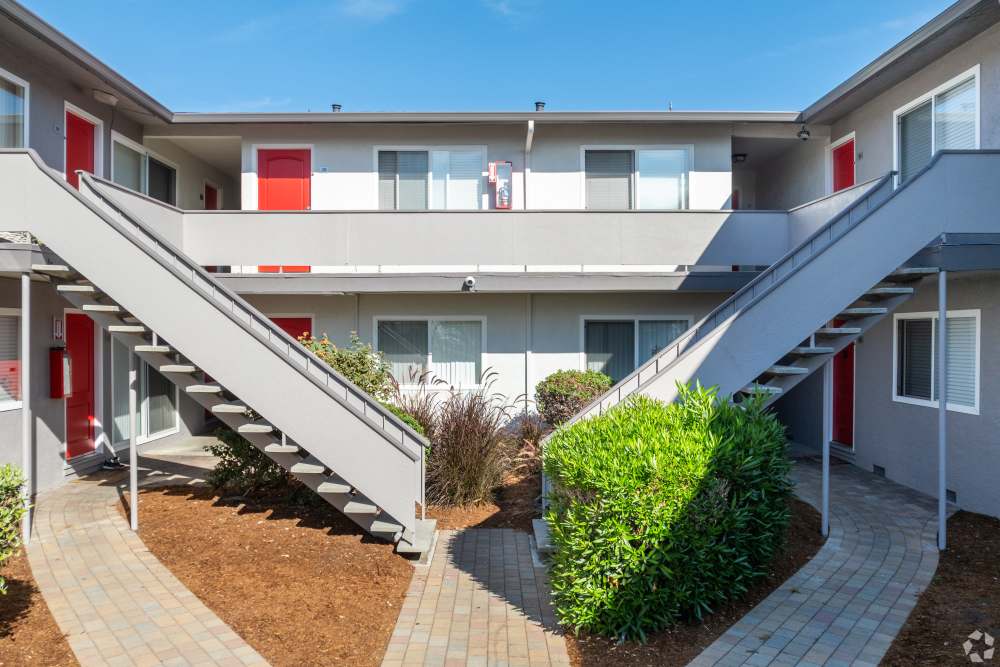 Two-Bedroom Apartments in San Leandro, CA - Marina Plaza Apartments -  Apartment Complex View, and Sidewalk Access