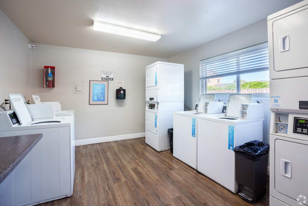 Pet-Friendly Apartments in San Leandro, CA - Marina Plaza Apartments- Laundry center 
