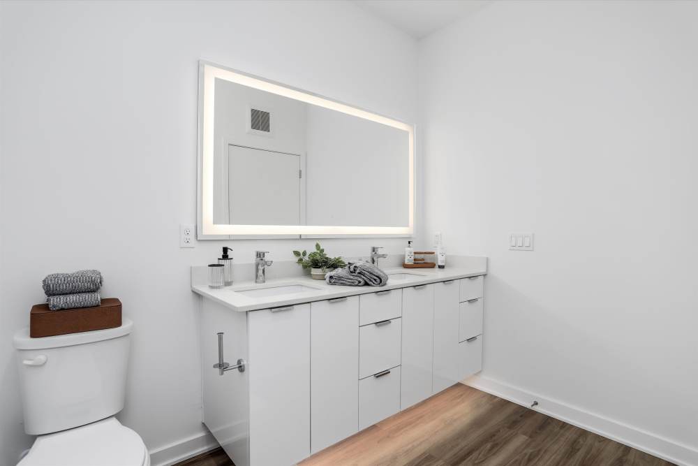 Bathroom with cabinets at Innova in Novi, Michigan