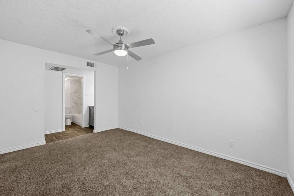 Room with a ceiling fan at Broadmoor Place in Irving, Texas