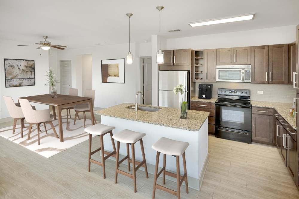 Dining area with Large Island and Spacious Kitchen in Helios in Englewood, Colorado