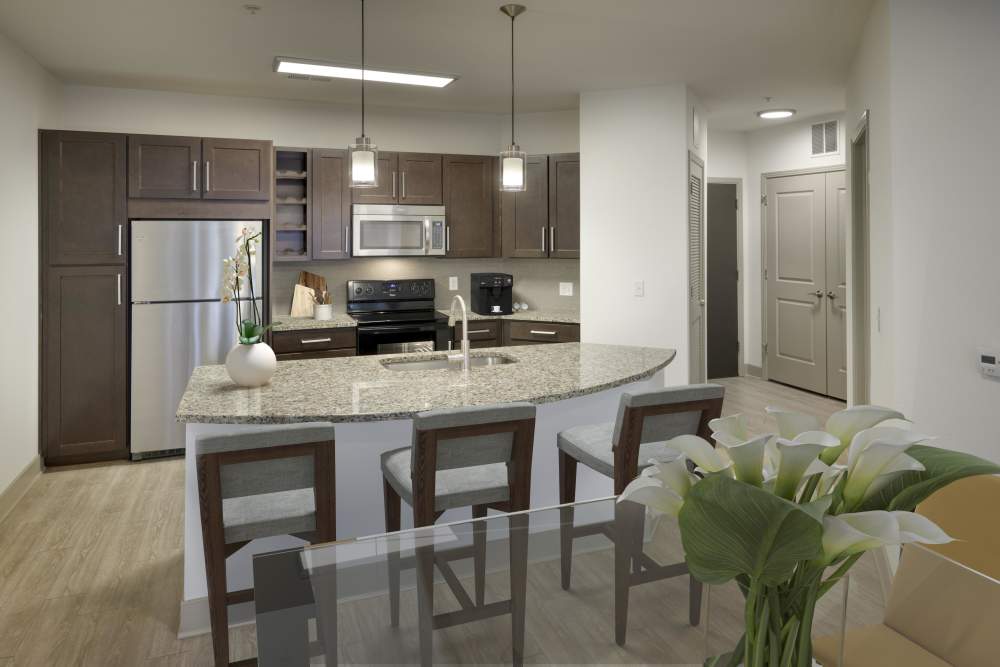 A kitchen with plenty of cabinet space at Helios in Englewood, Colorado