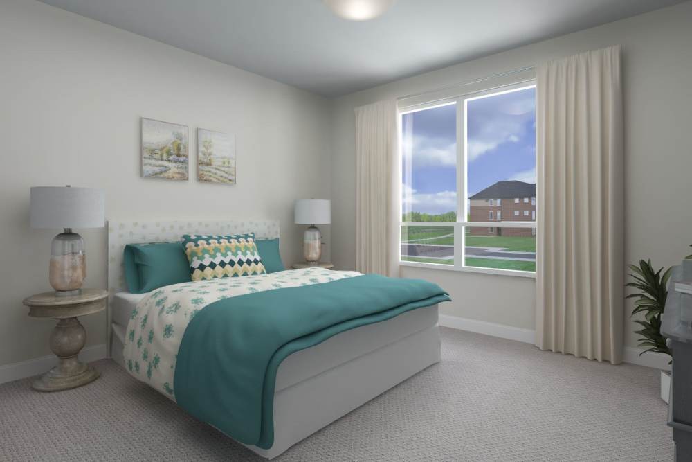 A bedroom with nightstand at Harmony at Tucker Station in Louisville, Kentucky