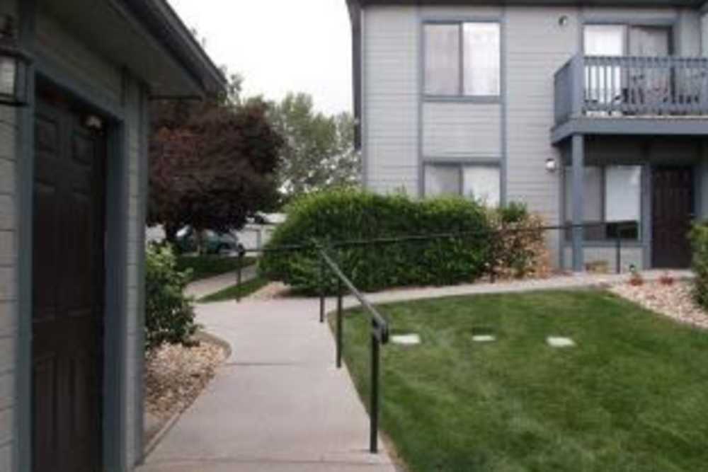 Walkway between buildings at Columbine Apartments in Littleton, Colorado