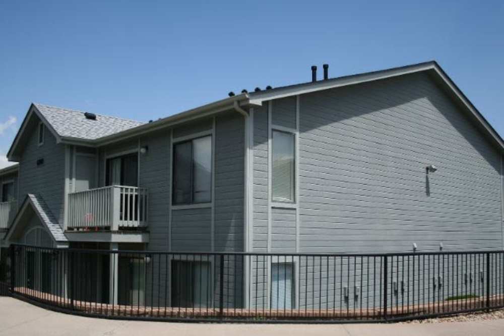 Fenced area around a building at Columbine Apartments in Littleton, Colorado