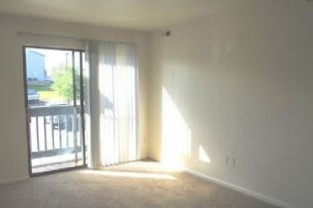 Apartment with a private balcony at Columbine Apartments in Littleton, Colorado