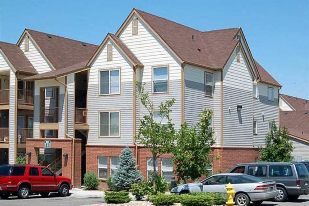 Exterior view of the apartment building at Spring Hollow Apartments in Brighton, Colorado