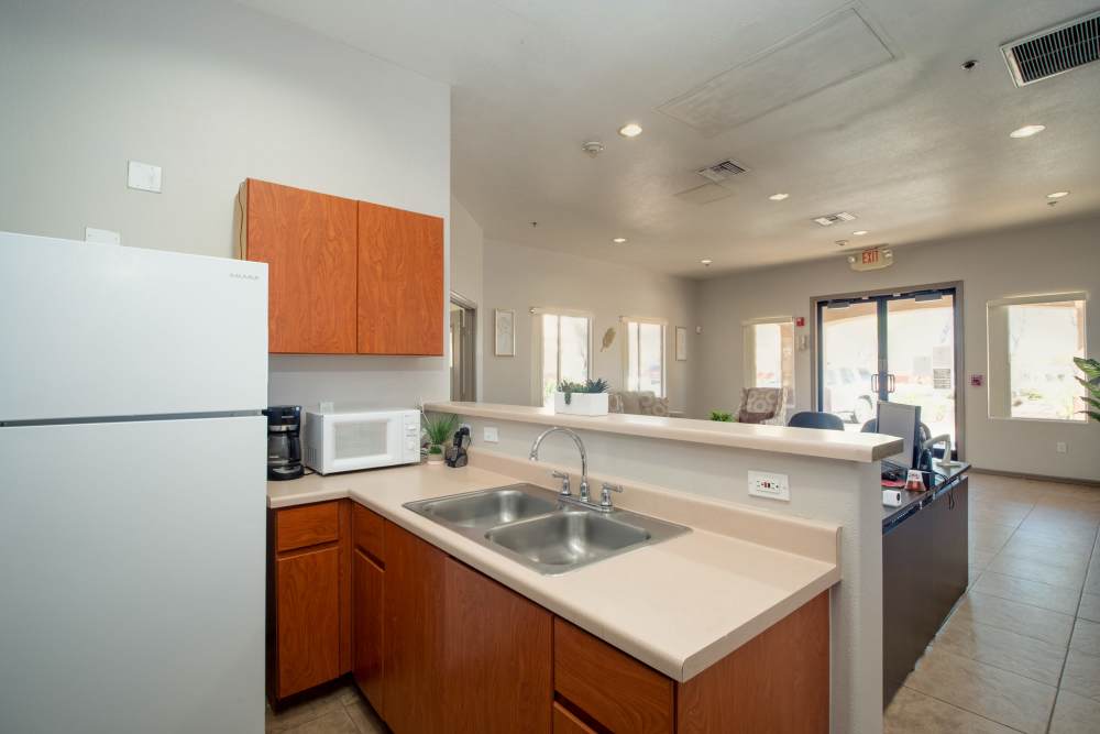 Clubhouse kitchen area at Steeple Chase Apartments in Peoria, Arizona