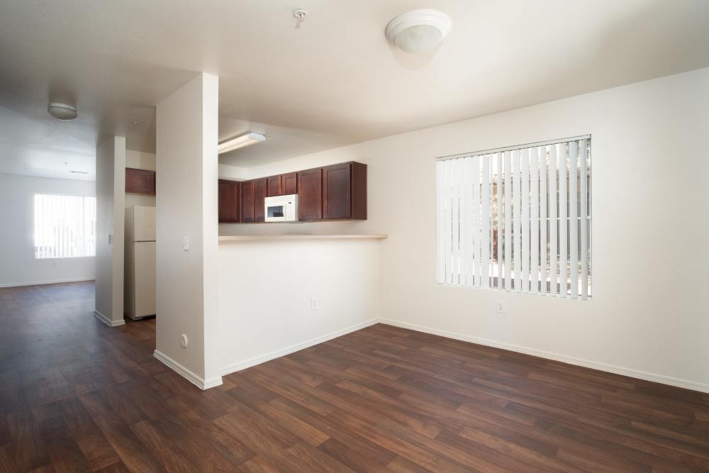 Wood-style flooring in a home at Steeple Chase Apartments in Peoria, Arizona
