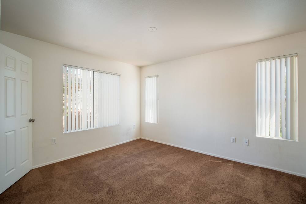 Apartment living room at Steeple Chase Apartments in Peoria, Arizona