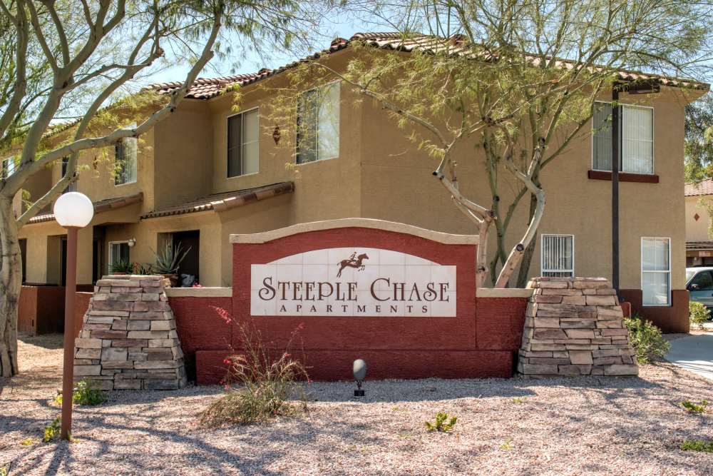 Community sign at Steeple Chase Apartments in Peoria, Arizona