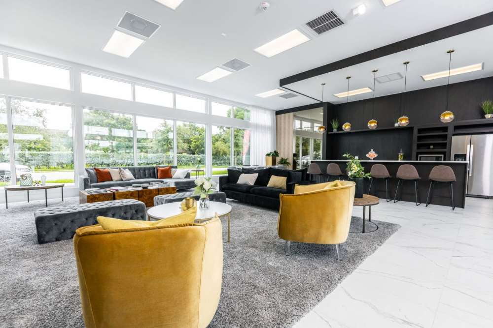 Resident lounge with seating at Sophia Square in Homestead, Florida