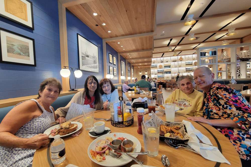 Residents enjoying breakfast at Lighthouse Pointe by Barclay House in Chesapeake, Virginia