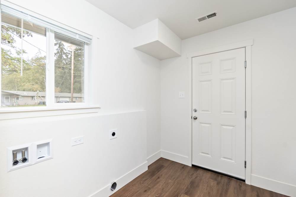 Laundry room with Window at New Hillside