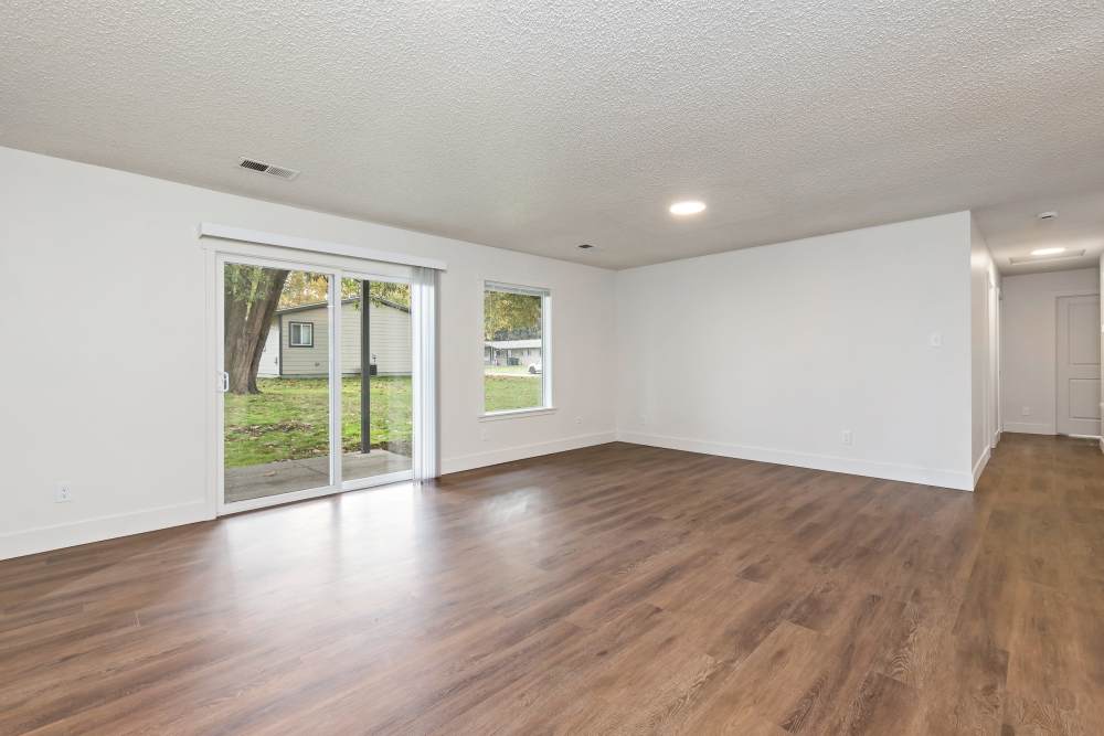 Livingroom with Can Lights and LVP Flooring