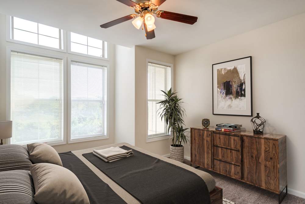 The west bedroom with ceiling fan at Manassas Station Apartments in Manassas, Virginia