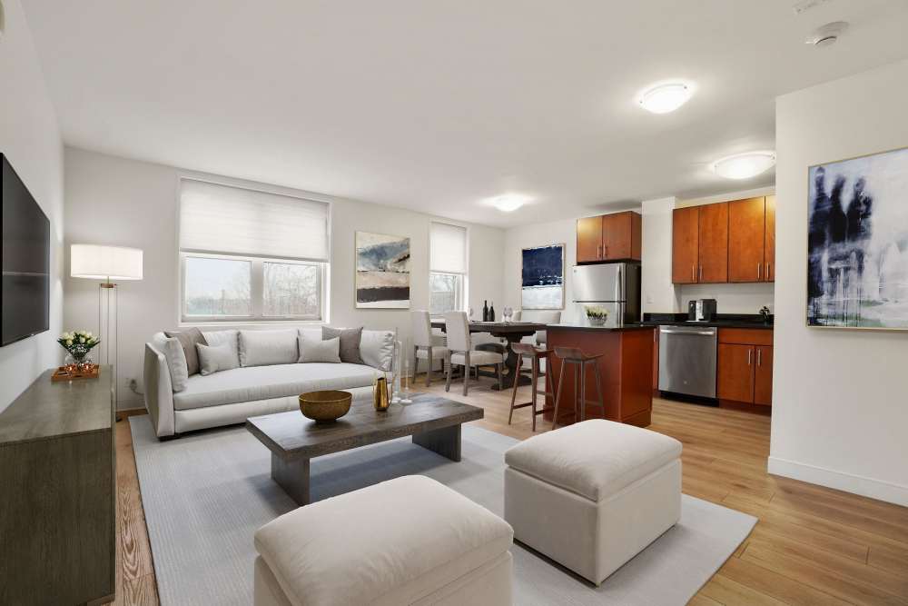 Modern kitchen with wood cabinets at Camelot Court in Brighton, Massachusetts