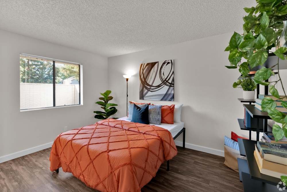 Bedroom with wood-style flooring at Ashford Park in Sacramento, California