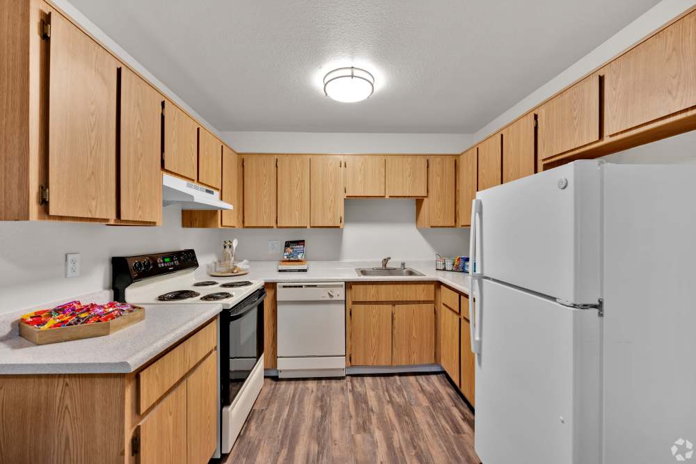 Kitchen with wood-style flooring at Ashford Park in Sacramento, California