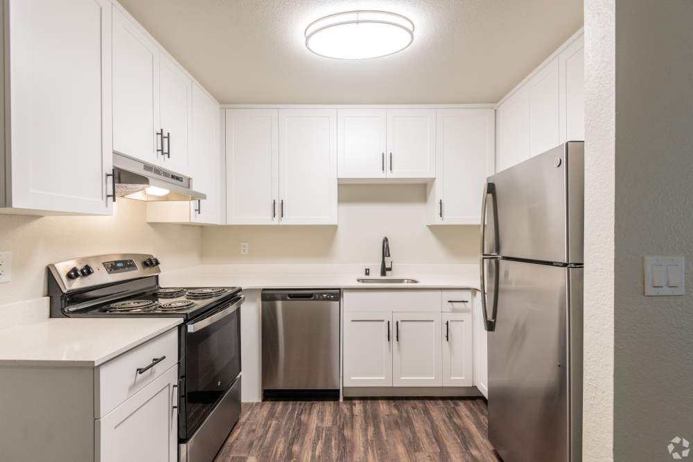 Kitchen with stainless-steel appliances at Ashford Park in Sacramento, California