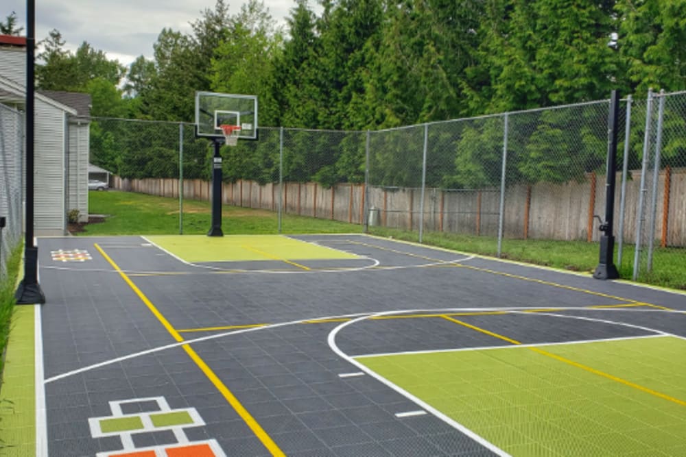 Outdoor Basketball Court With Green and Gray Flooring at Autumn Chase in Bothell, Washington