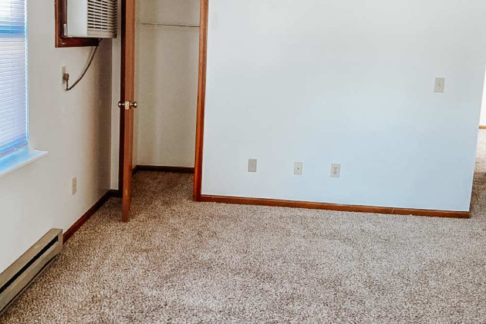 Bedroom with closet at Riverside Villas in Columbia City, Indiana