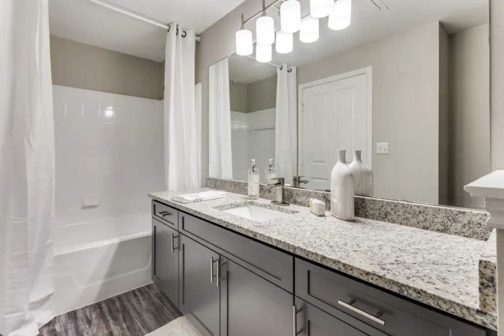Apartment bathroom at Oakville Apartments in Austin, Texas