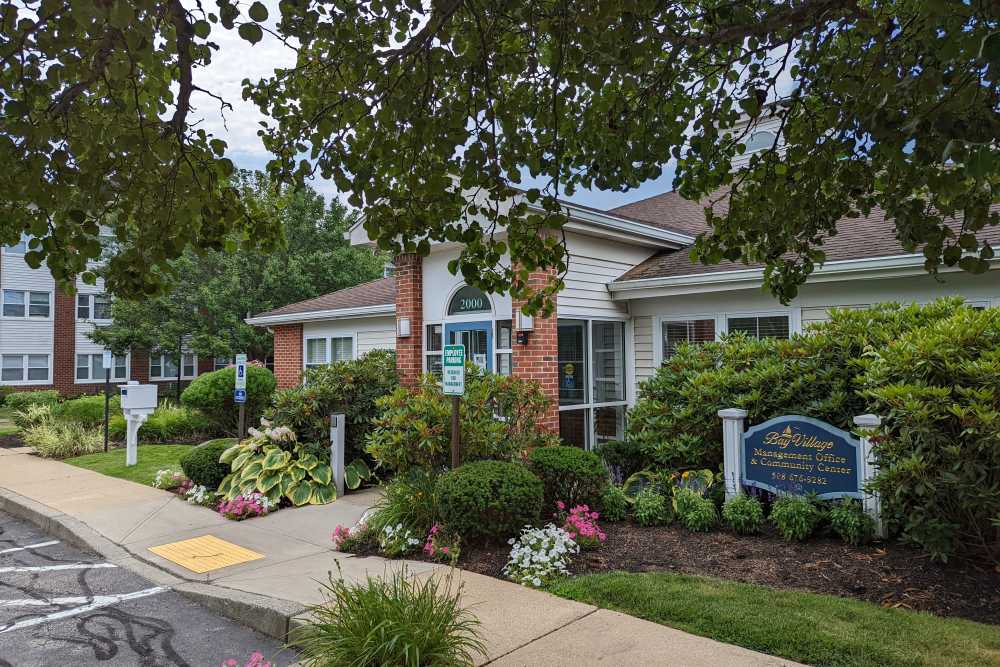 Parking in front of the leasing office at Bay Village in Fall River, Massachusetts