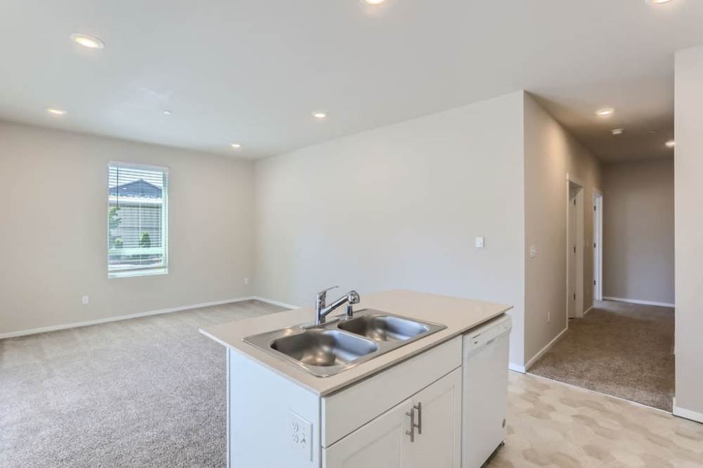 Bright living room and kitchen at The Lookout in Everett, Washington