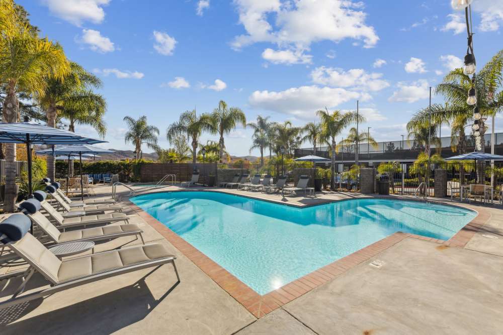 Sun Loungers by the Pool at Sofi at Wood Ranch in Simi Valley, California