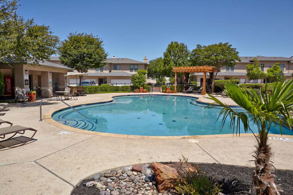 Outdoor pool at Oakville Apartments in Austin, Texas