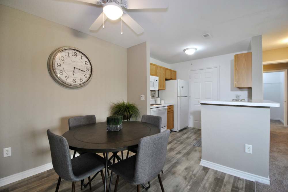Apartment Dining and Kitchen Area at Stratford Place at Brownstown in Brownstown, Michigan