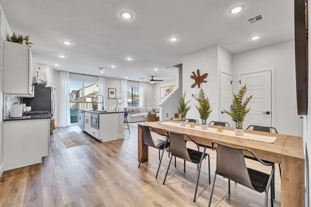 Dining are and kitchen featuring open floor plan and natural lighting at BB Living at The Oaks in Meridian, Idaho
