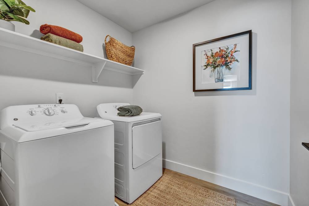 Laundry room featuring full size washer & dryer at BB Living at The Oaks in Meridian, Idaho