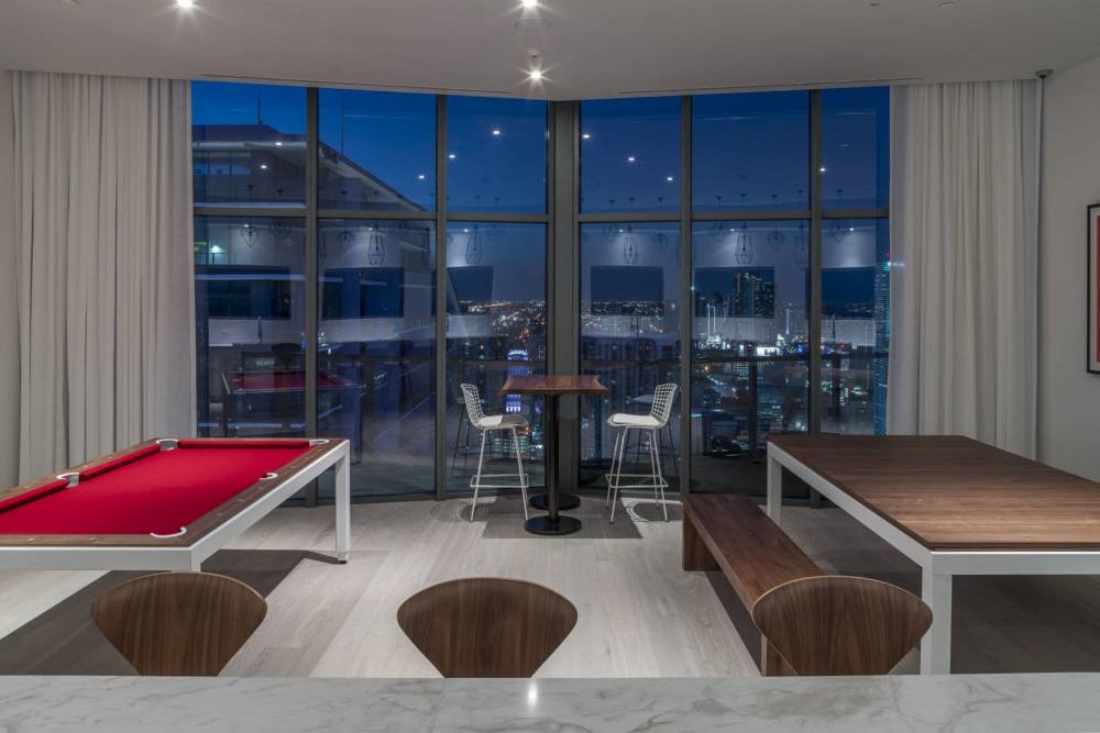 Clubhouse lounge with a city view at Solitair Brickell Apartments in Miami, Florida